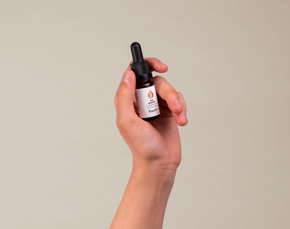 Purefy Product Shoot hand holding bottle